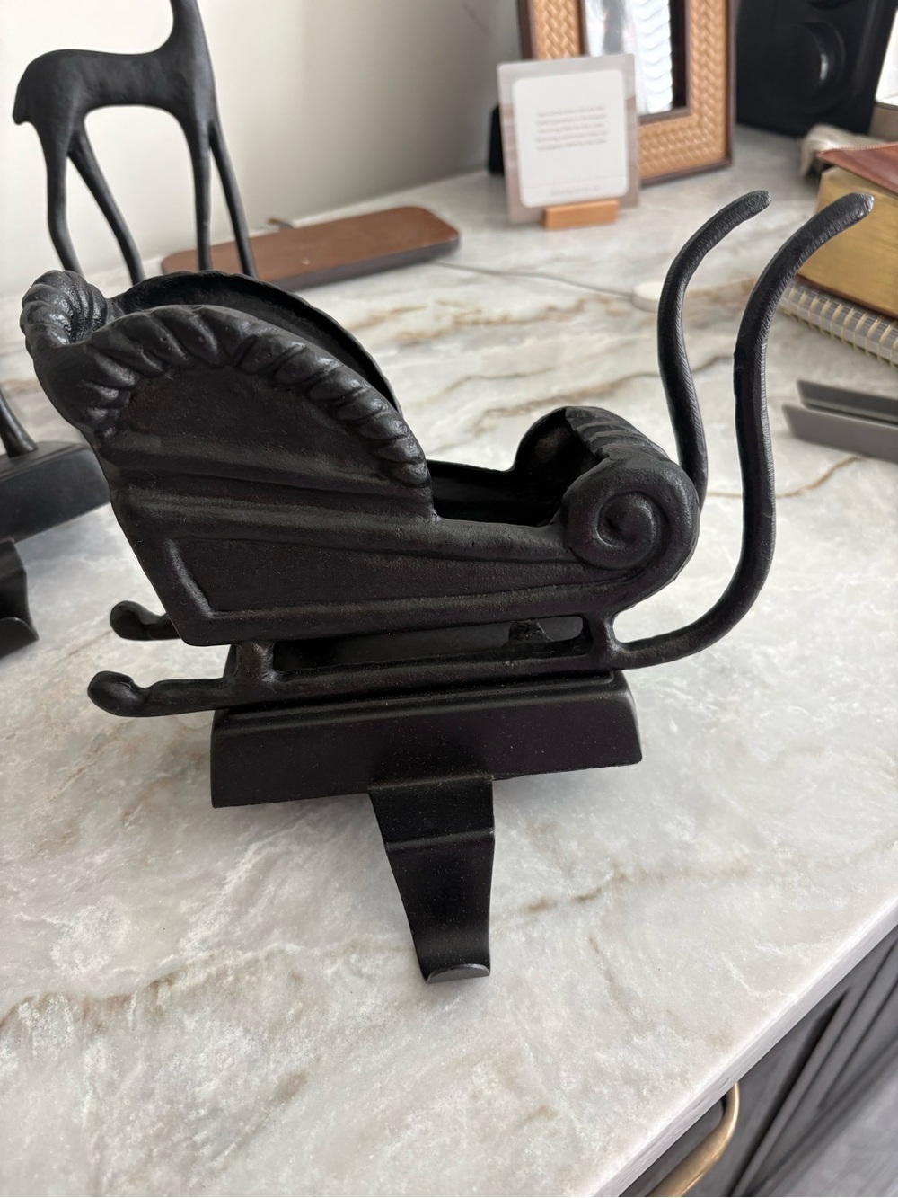 Pottery Barn retired cast iron sleigh stocking holder